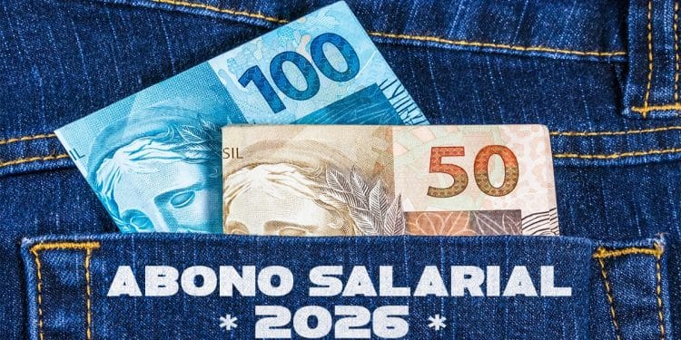 Cédulas de R$ 100 e R$ 50 saindo do bolso de uma calça jeans, representando o pagamento do Abono Salarial 2026
