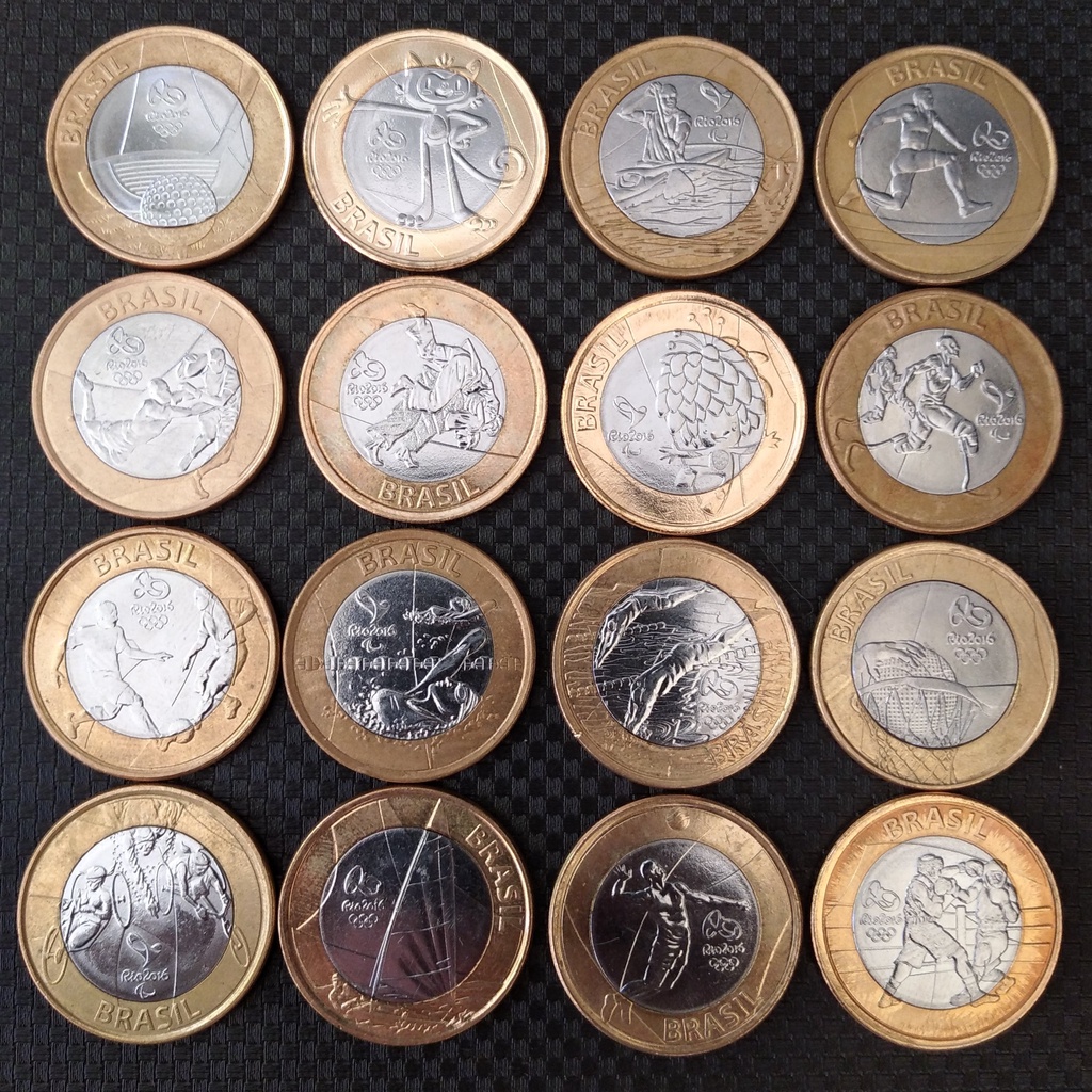 Coleção completa de moedas comemorativas das Olimpíadas Rio 2016, exibindo diferentes modalidades e mascotes.
