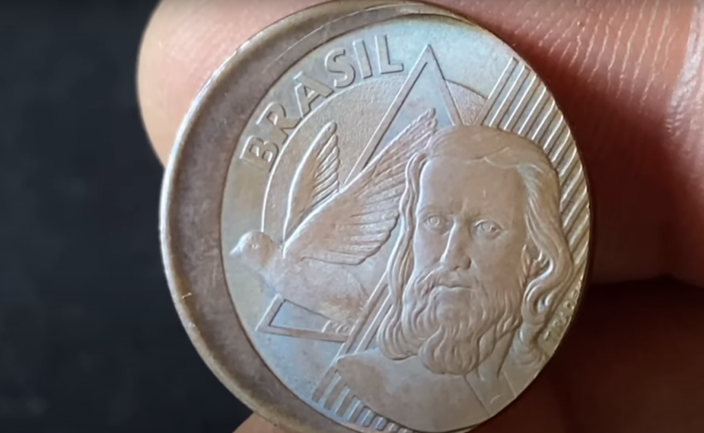 Moeda de 5 centavos com erro de cunhagem e disco descentralizado