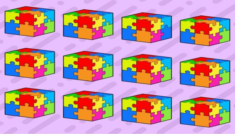 Teste de QI com múltiplos cubos de quebra-cabeça coloridos, com uma variação de padrão em um dos cubos.