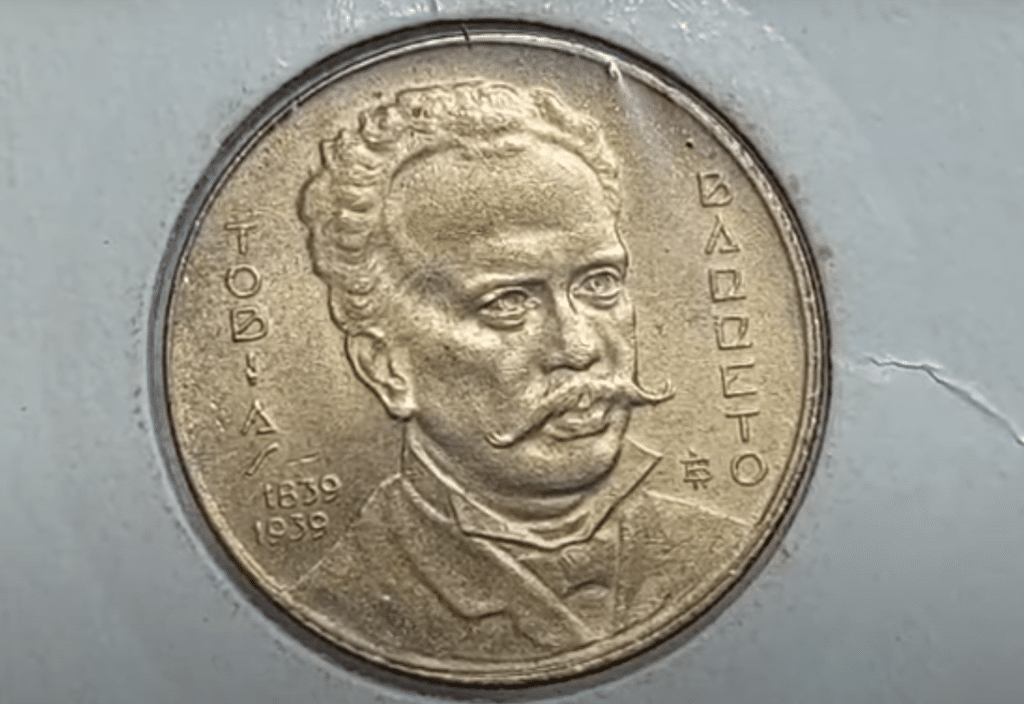 Anverso da moeda de 1.000 réis de 1939, com a efígie de Tobias Barreto e a data.