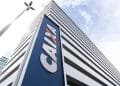 Fachada de prédio da Caixa, banco que paga o Pé-de-Meia e o ressarcimento do PIS/Pasep