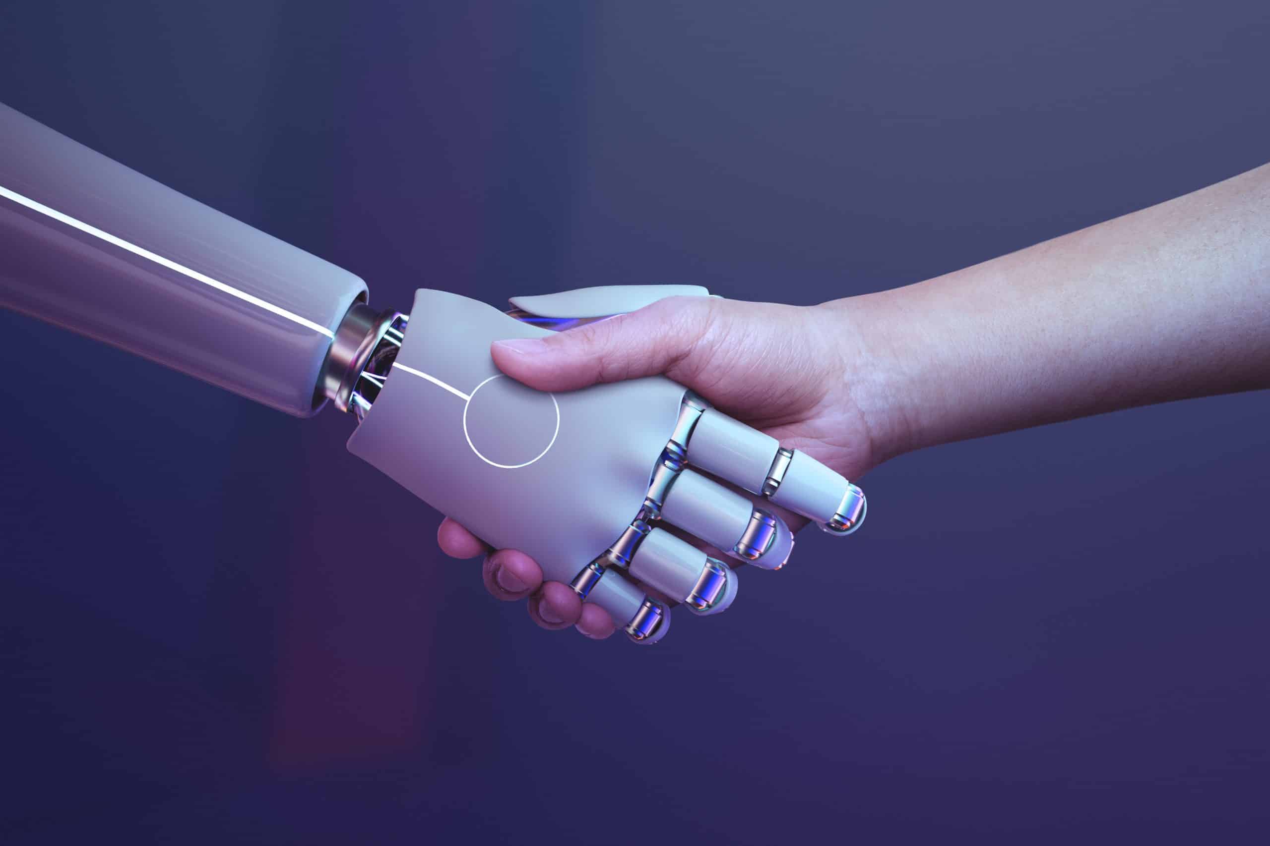 Aperto de mão entre um humano e um robô, simbolizando a parceria com a tecnologia para otimizar os estudos para o Enem.