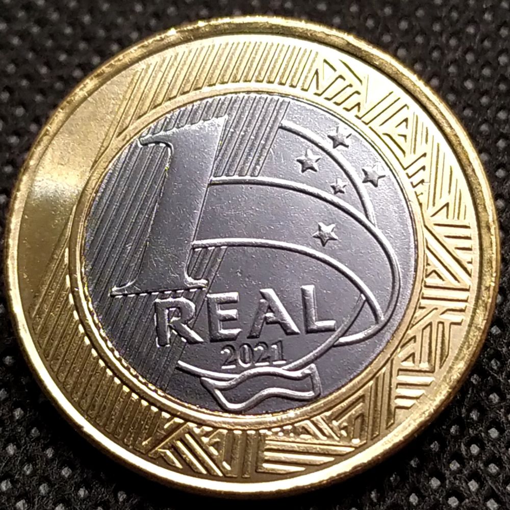 Reverso (Face do Valor) da moeda comum de 1 real do ano 2021, que pode esconder o raro erro de cunhagem "data marcada".