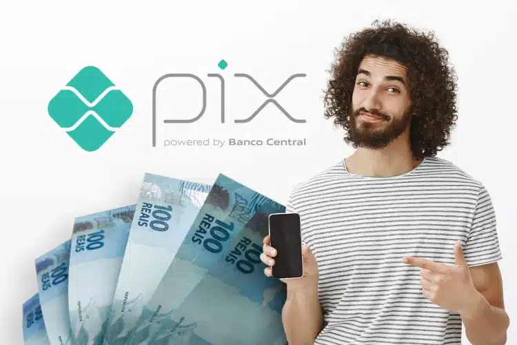 Imagem representando o Pix Automático, com uma pessoa segurando um celular e cédulas de 100 reais ao fundo.