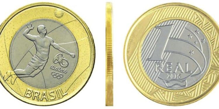 MMoeda de 1 Real Comemorativa Vôlei (Rio 2016), vista completa da anverso, reverso e lateral. A peça com o erro de "cabeça dupla" é valiosa para a numismática.