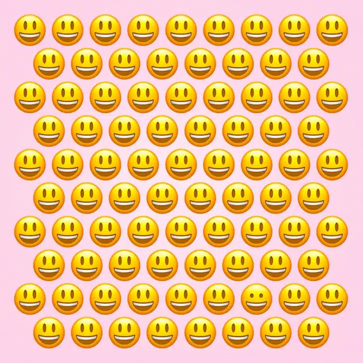 Teste visual com vários emojis amarelos sorridentes alinhados em fundo rosa claro