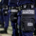 Agentes da Guarda Municipal alinhados, fardados e equipados, prontos para atuação urbana em 2026.