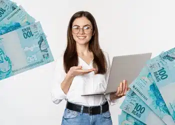 Mulher com notebook simboliza crescimento profissional e oportunidades de renda no mercado de trabalho.
