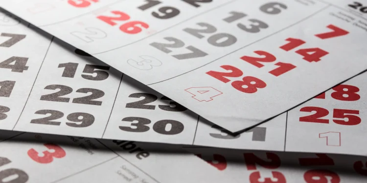 Calendário com datas destacadas em vermelho para março de 2026, sugerindo um feriado.