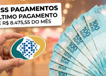 Mão exibe cartão do INSS ao lado de leque de notas de cem reais sobre fundo desfocado refletindo o último pagamento do teto do INSS de janeiro.