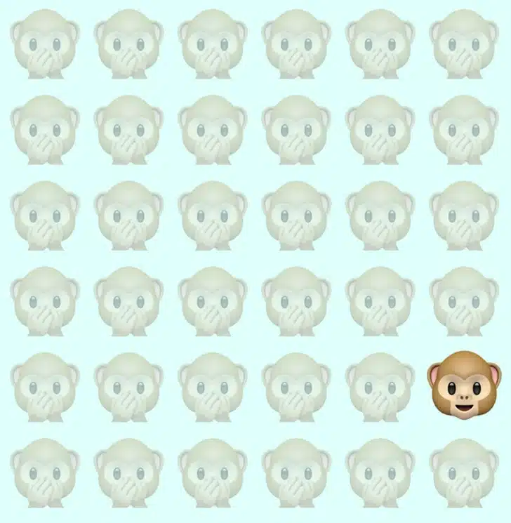 Desafio visual com diversos emojis de macaquinho alinhados; um deles sorrindo de boca aberta