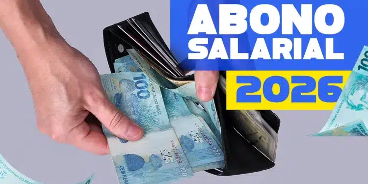 Carteira com cédulas de real simbolizando o pagamento do abono salarial PIS Pasep liberado para trabalhadores neste mês de abril