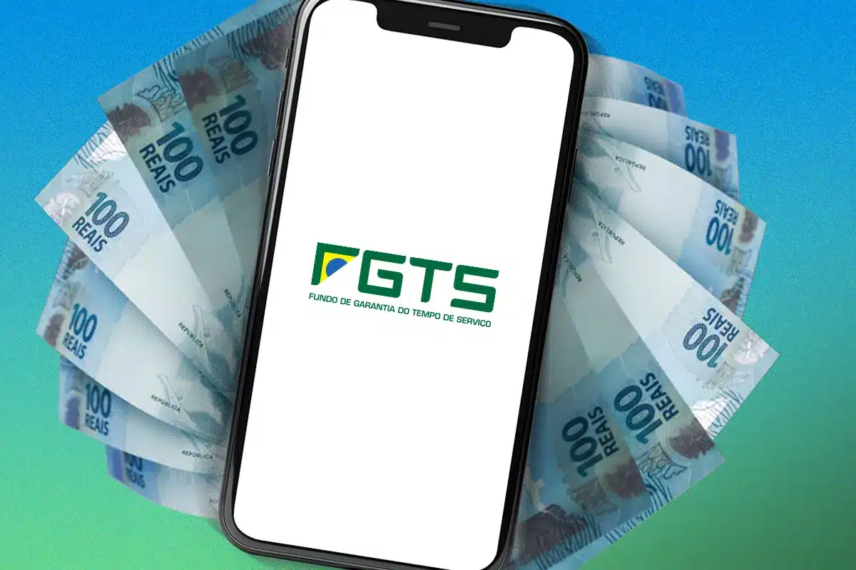 Smartphone exibindo o logotipo do FGTS — Fundo de Garantia do Tempo de Serviço — rodeado por notas de R$ 100, ilustrando o saque-aniversário do FGTS 2026 com prazo até 31 de março para trabalhadores nascidos em janeiro