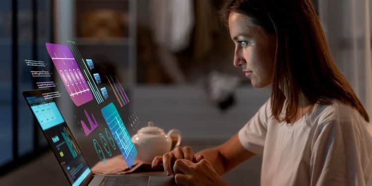 Profissional trabalhando com dados e interface digital, simbolizando a tecnologia e as profissões do futuro.