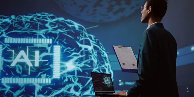 Especialista em tecnologia analisando dados de inteligência artificial em notebook com projeção digital futurista ao fundo.