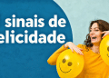 Mulher sorrindo do lado da frase "5 sinais de felicidade".