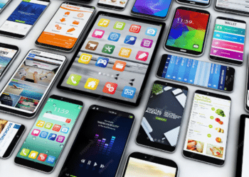 Diversos modelos de smartphones com telas coloridas exibindo aplicativos e interfaces, representando o mercado global de celulares.