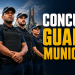 Quatro guardas civis metropolitanos de São Paulo em uniforme azul-marinho com coletes táticos e boné xadrez.
