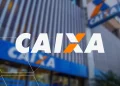 Fachada de agência da Caixa Econômica Federal com logotipo em destaque, banco responsável pela liberação do Saque Calamidade do FGTS para as novas cidades habilitadas em maio de 2026.