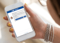 Página do Participante ENEM exibida em smartphone.