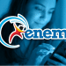 Jovem acessando informações do Enem pelo celular em ambiente moderno.