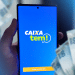 Tela de login do CAIXA Tem no celular, etapa inicial para recuperar o acesso após trocar de número.
